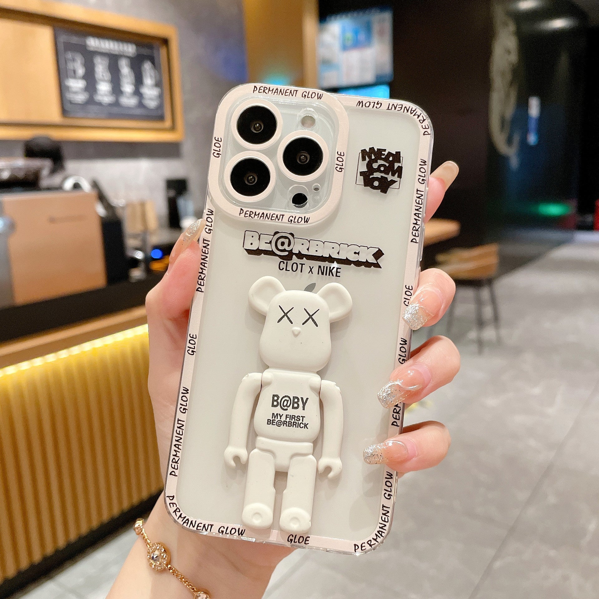 Applicable to Apple 15RO violent bear holder, mobile phone case iPhone12 13 all-inclusive soft case, angel eye case.